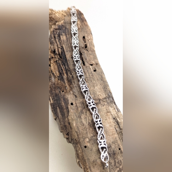 Genuine Diamond and Sterling Infinity Bracelet - Picture 6 of 7